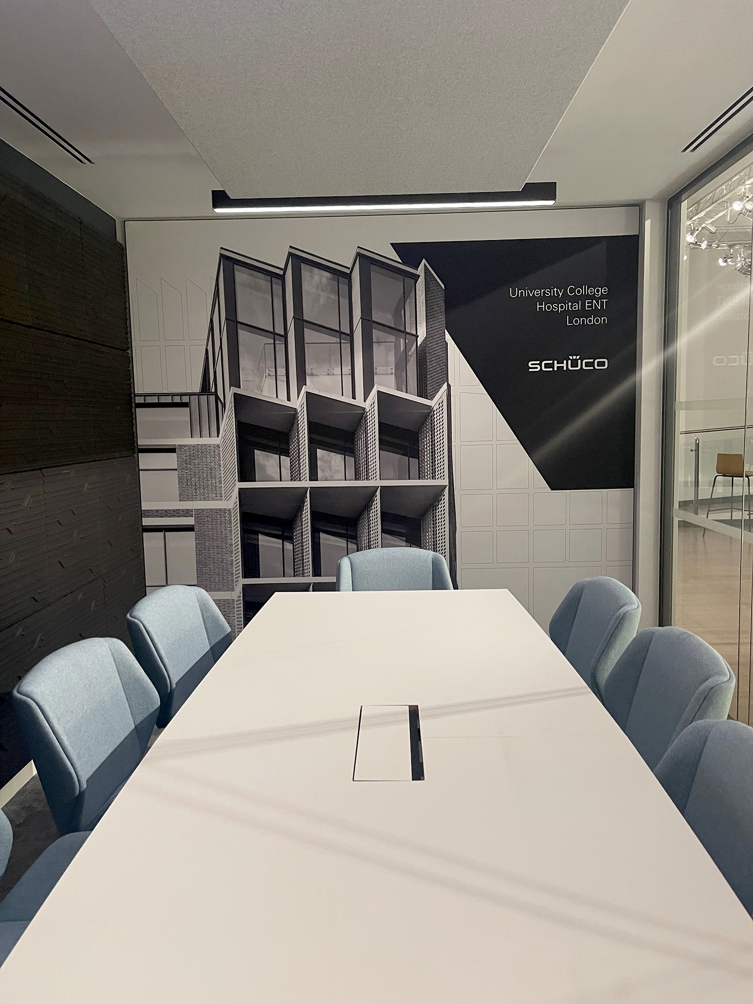 Schüco UK branded meeting room wall mural installation in Milton Keynes office refurbishment project